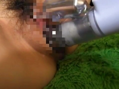 Japanese young girl is having fun with sex toy