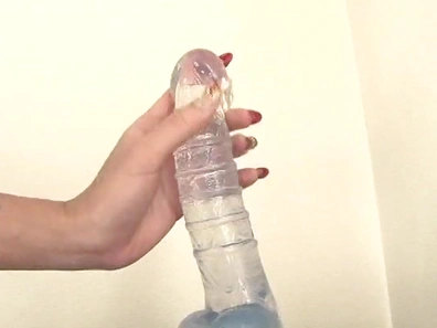 Eccentric blonde maid drills herself with fancy dildoes
